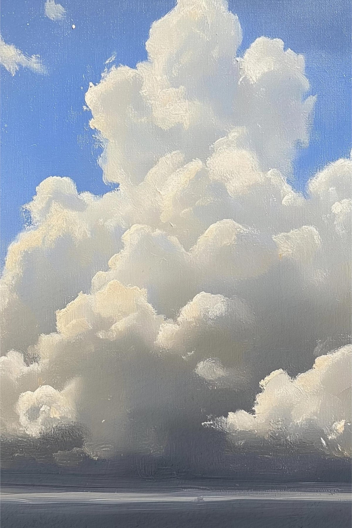 Cumulus boven de zee