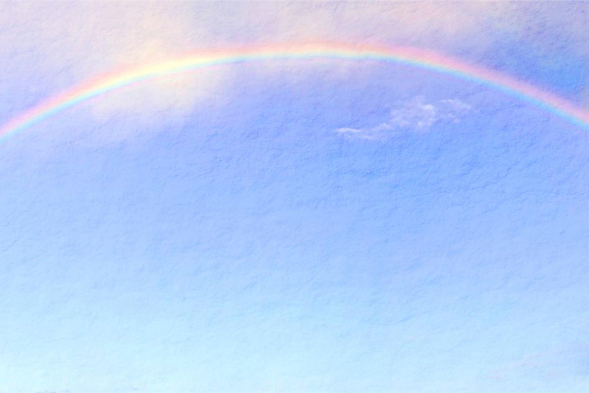 Rainbow over Blue Sky