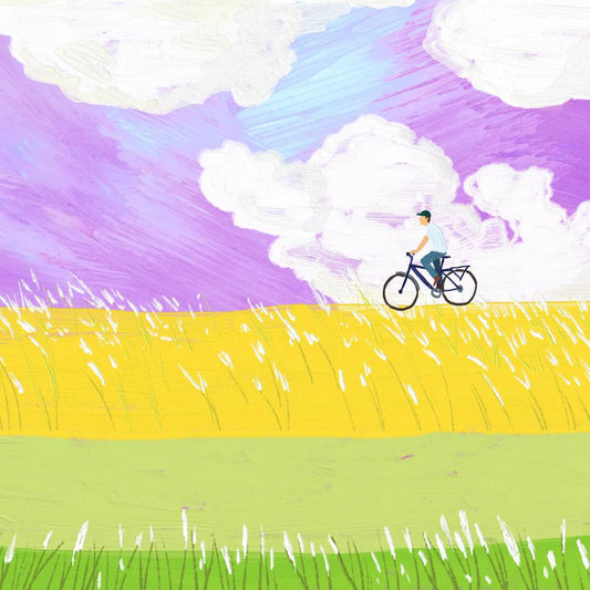 Cyclist in a Golden Field