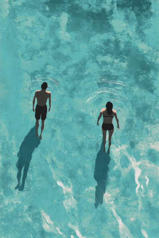 Swimmers in Turquoise Water